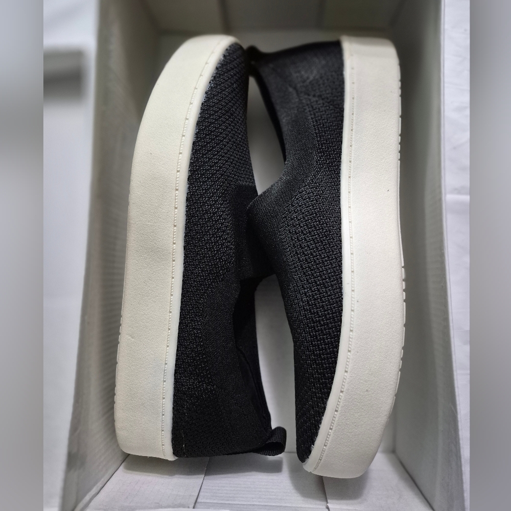 Stylish Black Sneakers with White Soles